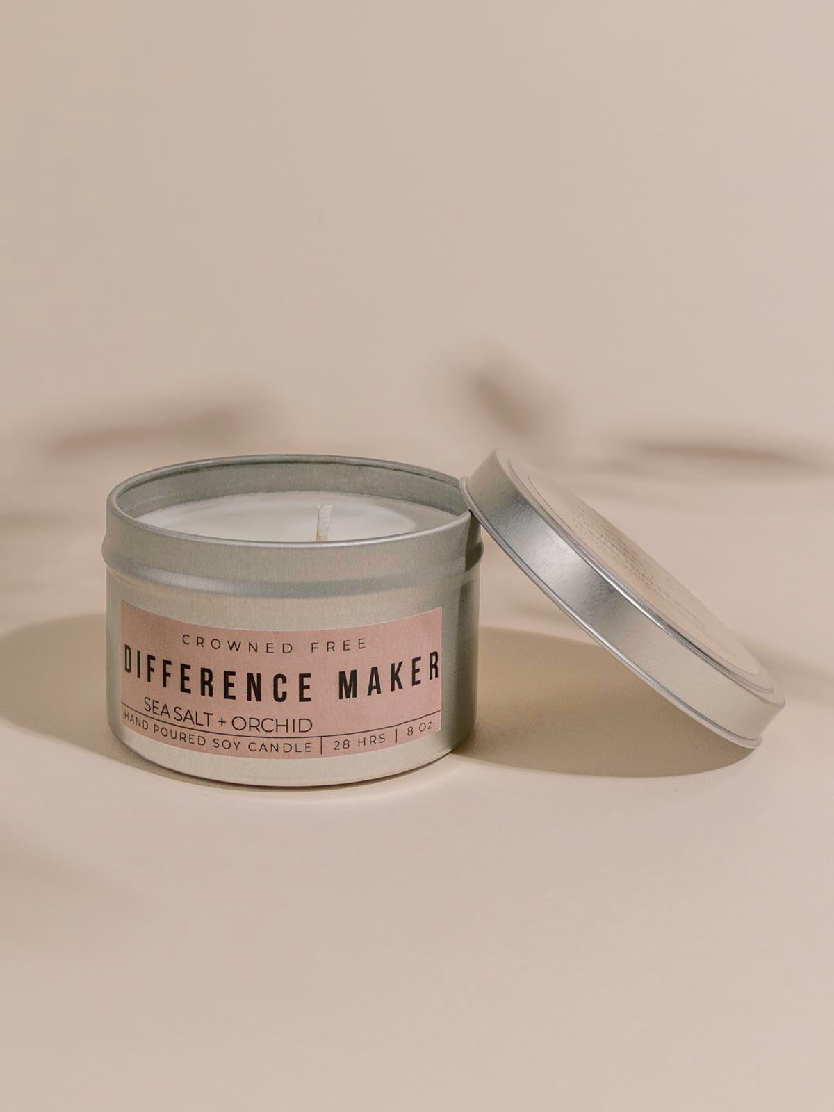 Crowned free candle on beige background